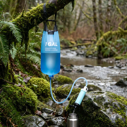 CLEARDRAW G1 hanging from a mossy branch, filtering creek water into a steel bottle